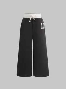 SHEIN Kleine Mädchen Numerisch Muster Kontrastfarbe Locker Lässig Alltagshose, Modische Streetwear Tweens Weite Bein Jogginghose Kleine Teen Mädchen Weite Bein Jogginghose Weite Bein Hose Kleine Teen Mädchen Kleine Teen Mädchen Jogginghose Kleine Teen Mädchen Jogginghose