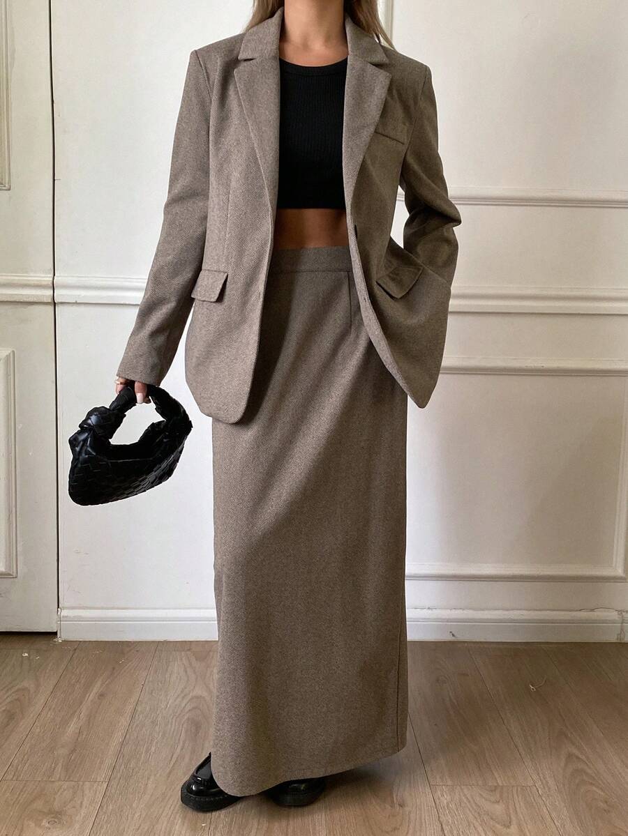 Bộ vest công sở thanh lịch dành cho nữ, gồm áo khoác blazer nâu rộng rãi và chân váy thẳng, phù hợp khi đi làm vào mùa thu đông - Màu Khaki - Xem 1