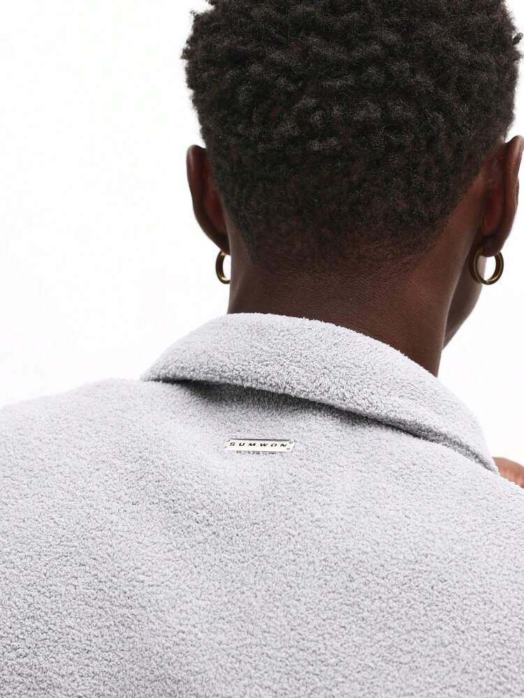 Chaqueta polar con cremallera y cuello