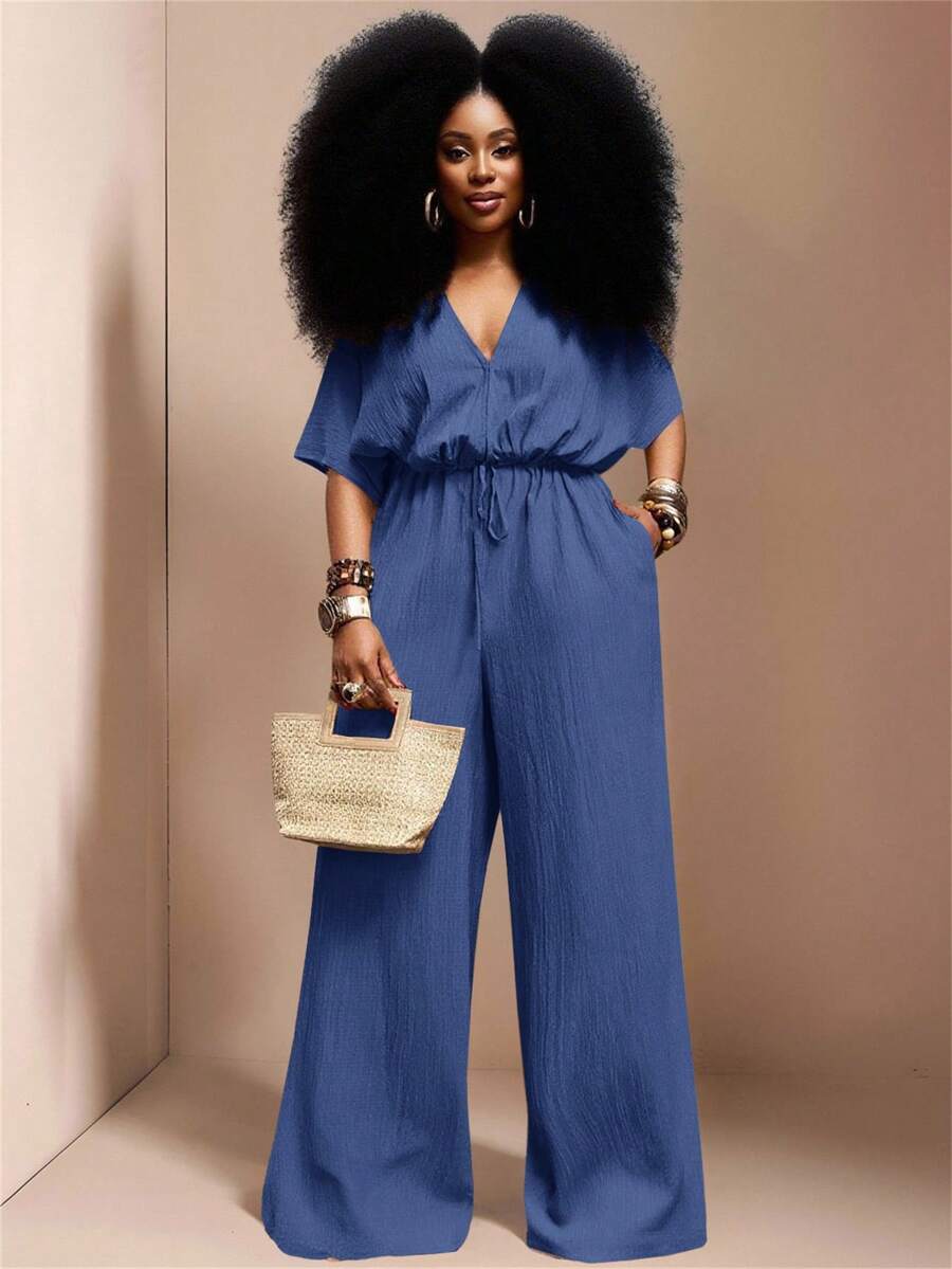 Veslaya Hàng mới về Thu Đông, Quần áo Thu/Đông nữ, Halloween, Lễ hội âm nhạc, Lễ Phục Sinh, Phong cách miền Tây, Phong cách du mục, Tiệc sinh nhật, Lễ tốt nghiệp, Trang phục học sinh, Thường ngày, Kỳ nghỉ, Du lịch tàu biển, Bãi biển, Tắm nắng, Thời trang, Bộ áo liền quần ống rộng màu trắng có họa tiết dành cho nữ cỡ lớn, eo rộng, ống đứng. - Màu xanh hải quân - Xem 1