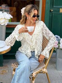 SHEIN Frenchy Camiseta de manga larga con volantes en el bajo y lazo delantero, de moda para mujer