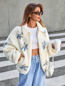 EURMUSE Ivory Flower Embroidered Teddy Jacket: Relaxed Fit, Great For Casual Outings Or Cozy Coffee Dates, Made From Soft Faux Shearling Fabric In Ivory With Blue And Beige 3D Flower Embroidery And A Front Zip Closure - White - View 3