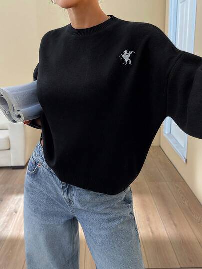 EURMUSE Minimalist Black Pullover With Signature Embroidery Detail Casual Black Embroidered Knit Pullover Sweater With Drop Shoulder And Loose Fit For Daily Chic Looks