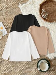 Set de 3 camisetas de manga larga con cuello redondo y estampado gráfico de dibujos animados lindos y casuales para niñas, de colores variados, tops de otoño para uso diario y al aire libre