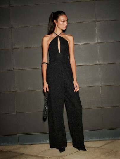 Nöista This Chic Black Jumpsuit Has A Halter Neckline, Bold Front Cutout, And Wide-Leg Fit For A Flattering Shape. Designed For Winter Nights, Christmas Parties, Or New Year's Eve, It's A Modern Piece In Women's Winter Fashion.
