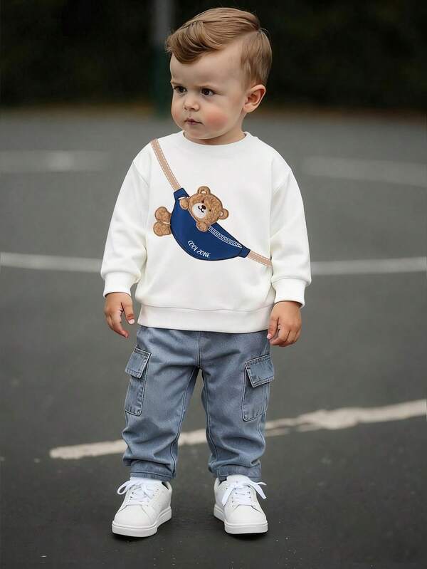 SHEIN Set de 2 piezas de sudadera de cuello redondo de manga larga con estampado de oso y pantalones vaqueros de cintura elástica con bolsillo para bebé/niño pequeño unisex, adecuado para uso casual, al aire libre y viajes, talla desde 6 meses hasta 2-3 años, otoño/invierno