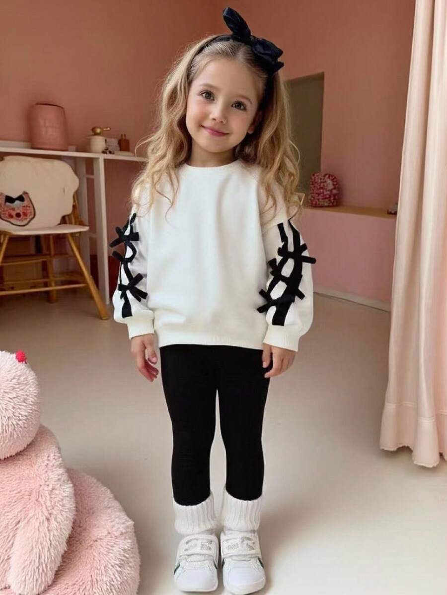 Set de 2 piezas de suéter de cuello redondo de manga larga con lazo 3D minimalista tejido y pantalones negros para niñas jóvenes, look casual, lindo y deportivo para otoño - Multicolor - Ver 1