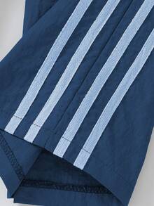 SHEIN Quần dài thường ngày in họa tiết sọc hai bên cạp chun cho bé gái tuổi teen - Màu xanh lam - Xem 5