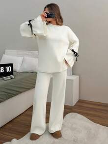 EURMUSE Ensemble tricoté 2 pièces pour femmes en tenues d'automne/hiver : pull col rond décontracté à manches ballons de couleur blanc pur avec ruban de couleur contrastante aux poignets et pantalon en tricot de couleur unie à jambes larges