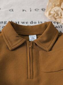 SHEIN Baby Boy/Girl Casual Outfit, Featuring Warm Color Palette And Minimalist Elegant Style. Cozy And Comfortable For Slightly Cool Seasons. Solid Color Half-Zip Collared Long Sleeve Top, Easy Pull-On Design; Paired With Solid Color Waistband-Free Pants. Suitable For Strolling, Leisure, Light Exercise, Or Cozy Family Gatherings, Allowing Your Little One To Shine With Childlike Charm And Vitality. Brown Toddler Outfit Brown Baby Boy Outfit - Coffee Brown - View 5