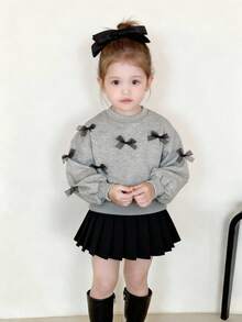 SHEIN Babygir Fashion Design Cute And Elegant Lady Baby Girl Adorable Knitted 2-Piece Set, Featuring A Long-Sleeve Sweatshirt With 3D Bow Decoration And An Elastic Waist Skirt, 2 Pieces In Total. Bow Sweatshirt, Black Pleated Skirt, Autumn And Winter Style Suitable For Indoors And Outdoors, Warm And Fashionable, Simple Style, Suitable For Indoor, Outdoor, Daily Wear, Sports, Playtime, Parties, Photoshoots, Vacations, And Festive Occasions. - Multicolor - View 2