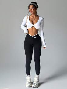 Easithlete Set de 2 piezas de ropa deportiva sin costuras para mujer, top de manga larga blanco y mallas negras