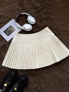 Muvela 女士百褶超短低腰裙，米色，加厚面料，内置短裤内衬，复古学院风，充满复古韵味，适合圣诞节、日常穿着、姐妹聚会等场合，优雅大方，是秋冬季的百搭单品。 - 米色 - 查看 5