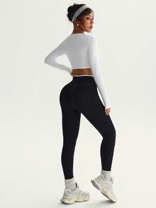 Easithlete Set de 2 piezas de ropa deportiva sin costuras para mujer, top de manga larga blanco y mallas negras