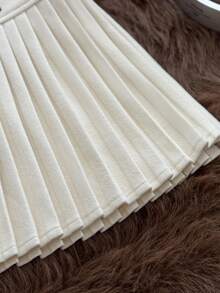 Muvela 女士百褶超短低腰裙，米色，加厚面料，内置短裤内衬，复古学院风，充满复古韵味，适合圣诞节、日常穿着、姐妹聚会等场合，优雅大方，是秋冬季的百搭单品。 - 米色 - 查看 2