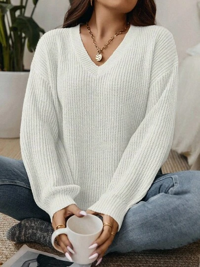 Nubod Suéter holgado de manga larga con cuello en V de unicolor para mujer de talla grande