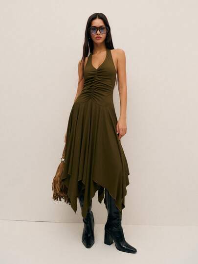 Nöista Halter Midi Dress With Ruched Front Detail And Flowing Asymmetrical Hem. Flattering Fitted Bodice With Soft Drape, Perfect For Spring And Summer Outfits, Evening Styling, Holidays, And Effortless Chic Looks.