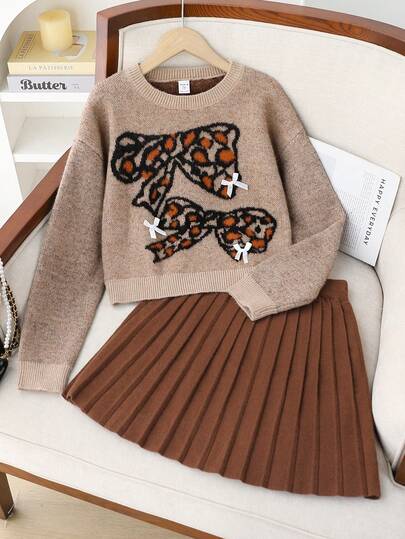 Sparklyn Teen Girls Camel Mohair Jacquard Leopard Print Bow + White Ribbon Bow Loose Cropped Knit Sweater With Coffee Pleated Skirt, Soft & Comfortable, Suitable For Daily, Outdoor, Travel, Vacation, Home, And Teen Girl Play Winter Christmas Halloween Toddler Cardigan Sweater Autumn Fall Jumpers Sweaters Tops Dress Dresses Christmas Jumper Cozy Pixies Prepcrw Christmas Outfit Halloween  New Born Toddler  Fall Winter Dress Halloween  Romper Stuff Halloween Jumper Jumper Cardigans Shirts White Cardigan Clean Downtown Off The Shoulder Sweater Outfit Sets Pink Sweater Jacket Cute Fall Outfits Outfits Top Maija Christmas Dress  Toddler Fall Dark Purple Skirt Christmas Sweater  Fall Sweaters Unisex White Sweater Vest Skirt Sets