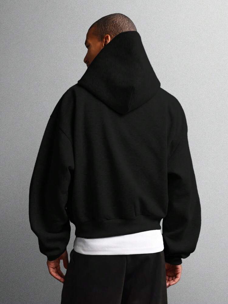 Sweat à capuche court avec cordon de serrage et poche