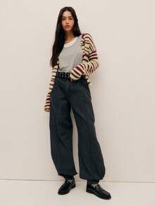 Nöista Relaxed-Fit Black Pants With A Vintage Washed Effect And Tapered Silhouette; Elasticated Cuffs And Minimal Seams Give Modern Flair For Fall Streetwear And Comfortable Winter Layering.