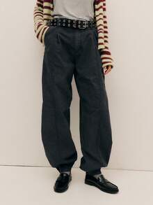 Nöista Relaxed-Fit Black Pants With A Vintage Washed Effect And Tapered Silhouette; Elasticated Cuffs And Minimal Seams Give Modern Flair For Fall Streetwear And Comfortable Winter Layering.