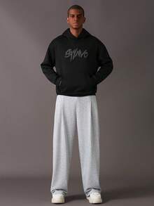 STYNVO Pantalones de chándal holgados de pierna ancha con bolsillos y cordón en la cintura, pantalones de chándal grises para hombre - Gris - Ver 3