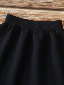 SHEIN Playful Pals Young Girl Casual And Cute Black Knitted Long-Sleeved Cardigan With Pearl Contrast Color And A Ruffled Knitted Short Skirt. Soft And Comfortable, Suitable For Daily Occasions, Outdoor Scenes, Travel Scenes, Vacation Scenes, Home Scenes, Nursery Scenes, And Children Playing - Black - View 11