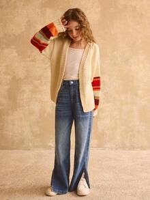 Nuevo suéter de estilo vintage de nicho para niñas preadolescentes en otoño/invierno con mangas a rayas de contraste arcoíris y diseño de cuello en V, suéter de punto holgado y grueso, chaqueta de punto oversize de moda