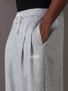 STYNVO Pantalones de chándal holgados de pierna ancha con bolsillos y cordón en la cintura, pantalones de chándal grises para hombre - Gris - Ver 6