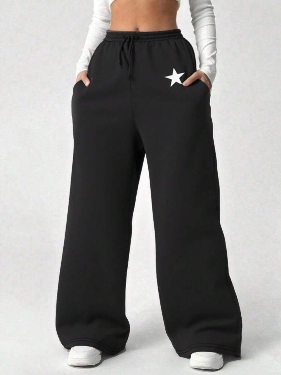 SHEIN Quần len in logo ngôi sao thường ngày cho bé gái tuổi teen, quần đa năng màu trơn phù hợp cho mọi hoạt động, thích hợp để đi làm, đi học, mặc thường ngày, du lịch, tiệc ngoài trời, thể thao, thích hợp cho mùa thu/đông - màu đen - Xem 1