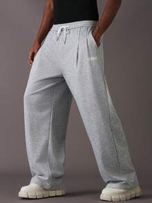 STYNVO Pantalones de chándal holgados de pierna ancha con bolsillos y cordón en la cintura, pantalones de chándal grises para hombre - Gris - Ver 1