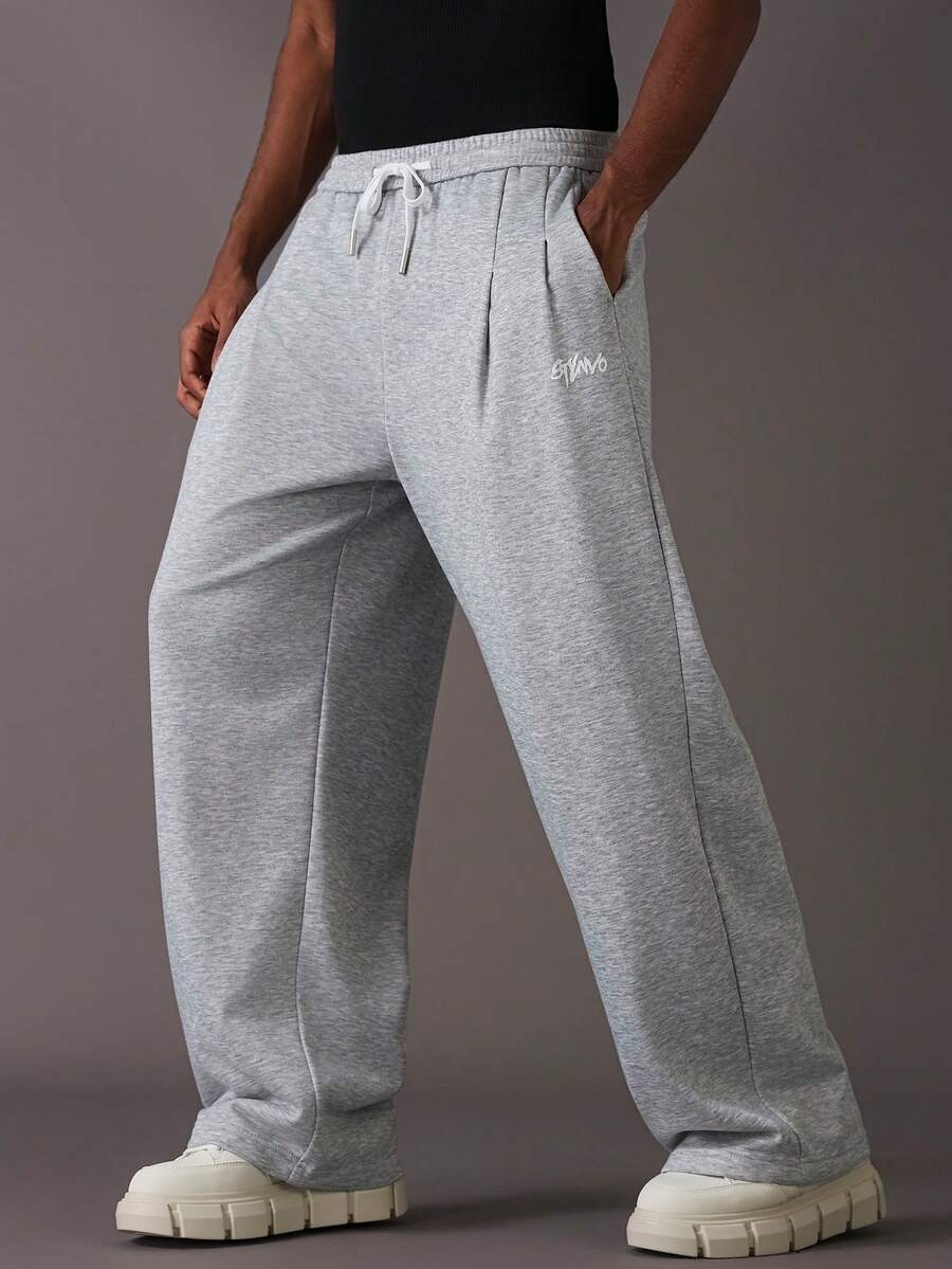 STYNVO Pantalones de chándal holgados de pierna ancha con bolsillos y cordón en la cintura, pantalones de chándal grises para hombre - Gris - Ver 1
