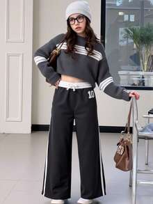 SHEIN Kleine Mädchen Numerisch Muster Kontrastfarbe Locker Lässig Alltagshose, Modische Streetwear Tweens Weite Bein Jogginghose Kleine Teen Mädchen Weite Bein Jogginghose Weite Bein Hose Kleine Teen Mädchen Kleine Teen Mädchen Jogginghose Kleine Teen Mädchen Jogginghose