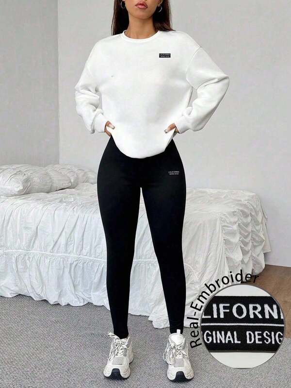 SHEIN EZwear 2 件套休闲宽松圆领运动衫和紧身刺绣字母打底裤套装，适合居家、街头、机场、运动和瑜伽穿着，时尚