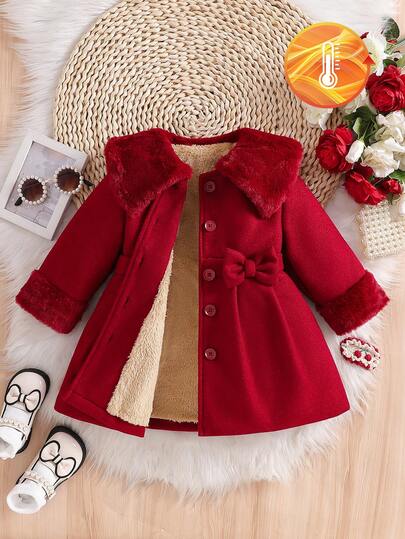 SHEIN Baby Girls' Solid Color Fluffy Lapel 3D Bow Wool Blend Dress Coat. The Collar And Cuffs Are Made Of Fluffy Fabric, Fashionable And Generous; The Solid Color Buttons On The Placket Are Simple And High-End; The 3D Bow At The Waist Is Cute, And The A-Line Silhouette Is Suitable For Babies Of Different Body Types. Whether To Play Or Taking Photos, It Can Make The Baby The Most Eye-Catching Little Princess.