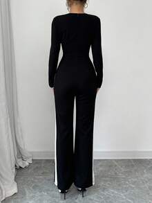 Selianne Czarno-biały kombinezon z wysokim stanem i łatami, dopasowany do sylwetki - Czarne - Zobacz 2