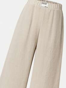 SHEIN Tween Girl 极简主义宽松垂坠阔腿裤，带提花徽标饰边 - 杏色 - 查看 4