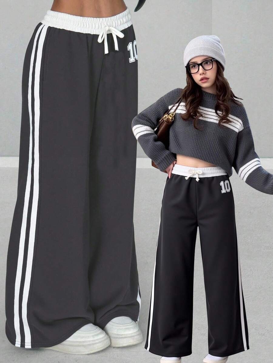 SHEIN Kleine Mädchen Numerisch Muster Kontrastfarbe Locker Lässig Alltagshose, Modische Streetwear Tweens Weite Bein Jogginghose Kleine Teen Mädchen Weite Bein Jogginghose Weite Bein Hose Kleine Teen Mädchen Kleine Teen Mädchen Jogginghose Kleine Teen Mädchen Jogginghose