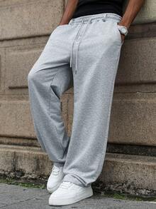 Manfinity Hypemode 年轻时尚的运动风灰色男士抽绳腰带运动裤，灰色喇叭裤，灰色慢跑裤，男士阔腿运动裤，男士专业俱乐部运动裤，男士冬季服装，送给男友的完美礼物，时尚百搭，适合街头、校园和万圣节等场合 - 灰色 - 查看 4