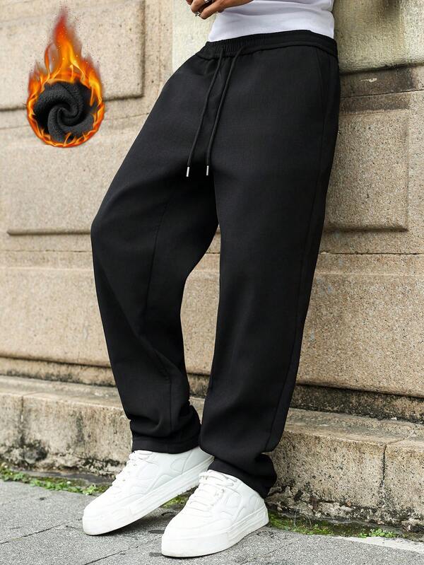 Manfinity EMRG Thermisch gefütterte, lässige, einfarbige Herren-Hose mit Kordelzug und weiter Passform