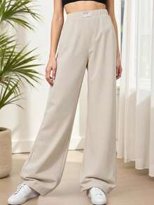 SHEIN Tween Girl 极简主义宽松垂坠阔腿裤，带提花徽标饰边 - 杏色 - 查看 5