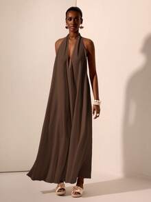 Zivah Hàng mới về Xuân/Hè 2025, Lễ hội âm nhạc, Lễ Phục sinh, Ngày lễ Thánh Patrick, Phong cách phương Tây, Du mục, Tiệc sinh nhật, Tốt nghiệp, Đại học, Sinh viên, Thường ngày, Cơ bản, Giải trí, Kỳ nghỉ, Du lịch du thuyền, Bãi biển, Tắm nắng, Thời trang, Thời trang đường phố, Khách dự tiệc cưới, Phong cách Bohemian, Đi làm, Ăn trưa, Trang phục sân bay, Váy maxi cổ chữ V sâu buộc dây họa tiết màu trắng, Váy maxi hở lưng - màu nâu - Xem 5