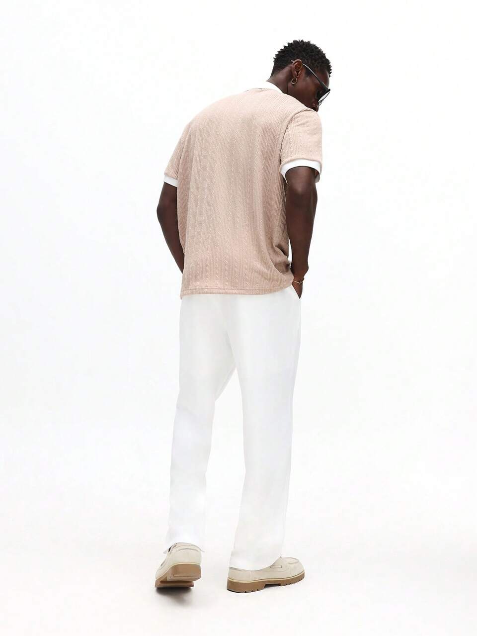 Polo in maglia a trecce con finiture a contrasto