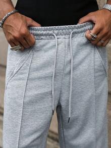 Manfinity Hypemode Pantalones de chándal grises casuales y con dobladillo dividido para hombres jóvenes - Gris - Ver 7