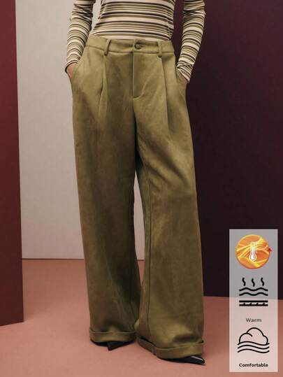 Nöista 优雅的橄榄绿丝绒长裤，阔腿廓形，收腰设计。是女士秋季的完美之选，兼具舒适与精致，是您假日或冬季衣橱的理想之选。