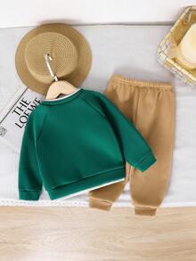 SHEIN 2 Stücke/Set Baby Jungen/Mädchen Lässiger, süßer Drop-Shoulder Crew Neck Strick Sweatshirt und Strick Hose mit Gummibund Zweiteiler, geeignet für Herbst/Winter Tragen