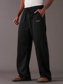 STYNVO 男士休闲百搭字母印花运动裤 男士宽松版型裤 男士黑色运动裤 男士抽绳裤 男士宽松运动裤 专业俱乐部运动裤 - 黑色 - 查看 4