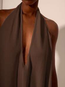 Zivah Hàng mới về Xuân/Hè 2025, Lễ hội âm nhạc, Lễ Phục sinh, Ngày lễ Thánh Patrick, Phong cách phương Tây, Du mục, Tiệc sinh nhật, Tốt nghiệp, Đại học, Sinh viên, Thường ngày, Cơ bản, Giải trí, Kỳ nghỉ, Du lịch du thuyền, Bãi biển, Tắm nắng, Thời trang, Thời trang đường phố, Khách dự tiệc cưới, Phong cách Bohemian, Đi làm, Ăn trưa, Trang phục sân bay, Váy maxi cổ chữ V sâu buộc dây họa tiết màu trắng, Váy maxi hở lưng - màu nâu - Xem 8