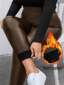 SHEIN Essnce Leggings de piel de poliuretano negro con forro térmico, de moda básica y casual para mujer de talla grande en otoño e invierno, pantalones para mujer, atuendos de invierno, pantalones para curvas, ropa de calle, pantalones de cuero, leggings con forro polar, leggings con forro térmico, leggings cálidos, medias para mujer - Bronce - Ver 1