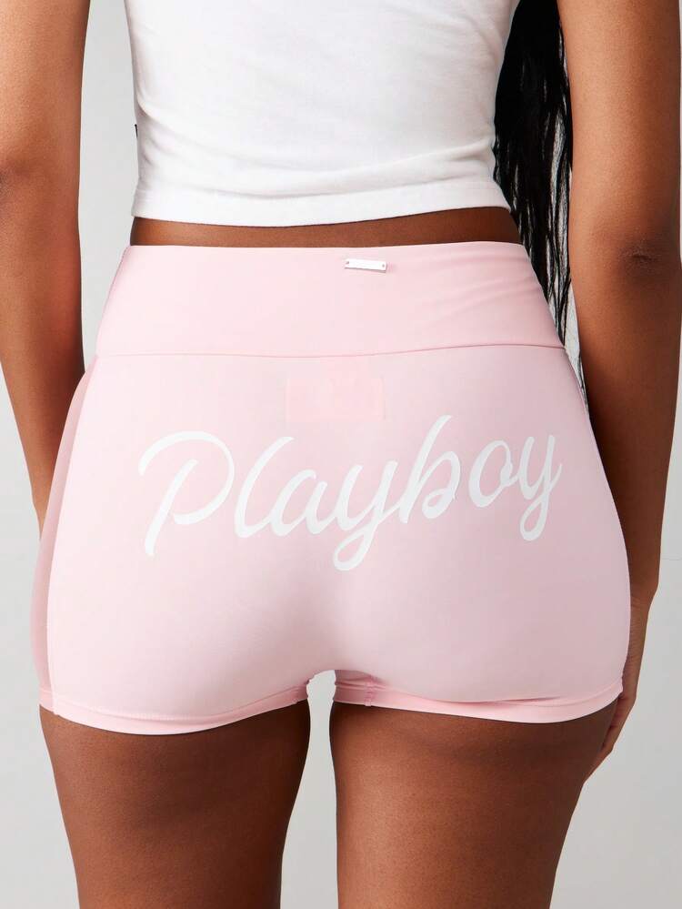Missguided x Playboy High Waisted Athletic Shorts With Cut Out Detail And Text Print